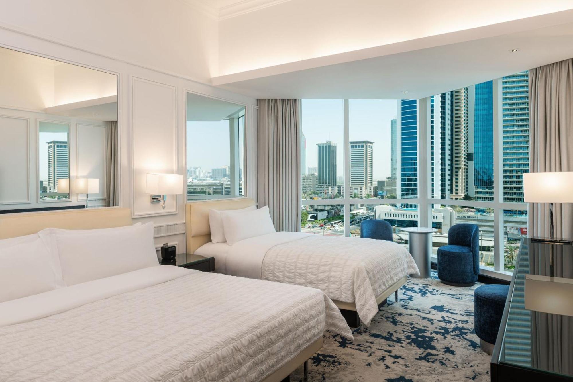 Le Meridien Mina Seyahi Beach Resort & Waterpark Dubai Exterior photo Deluxe Room