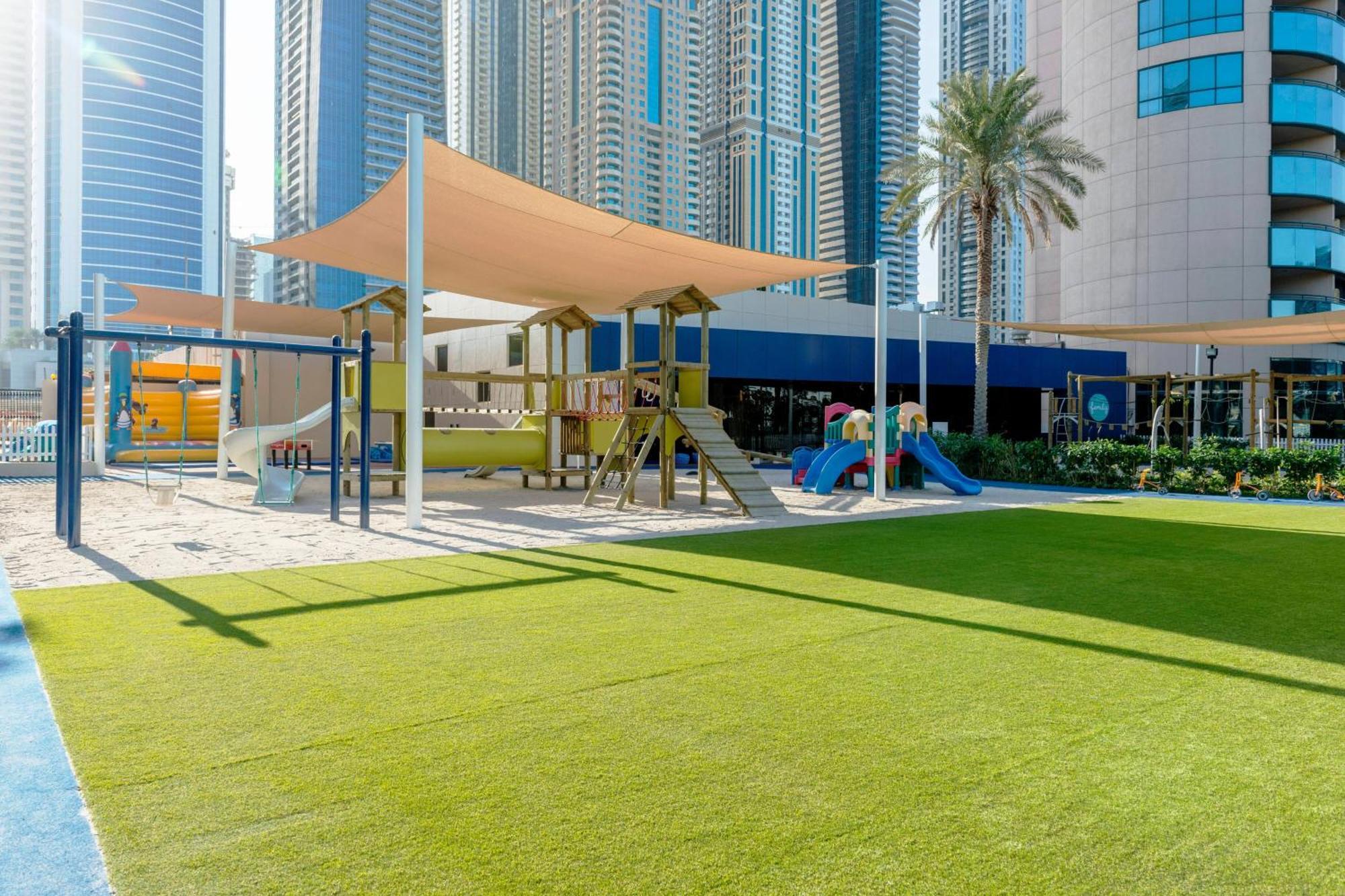 Le Meridien Mina Seyahi Beach Resort & Waterpark Dubai Exterior photo Children's play area